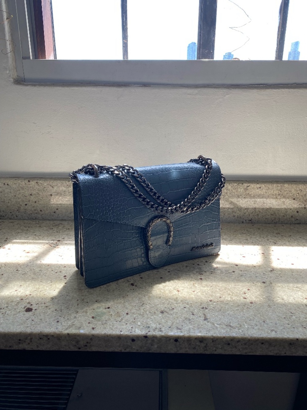 Marina Galanti Crossbody Horseshoe Leather Chain Crossbody Purse (blue, leather)